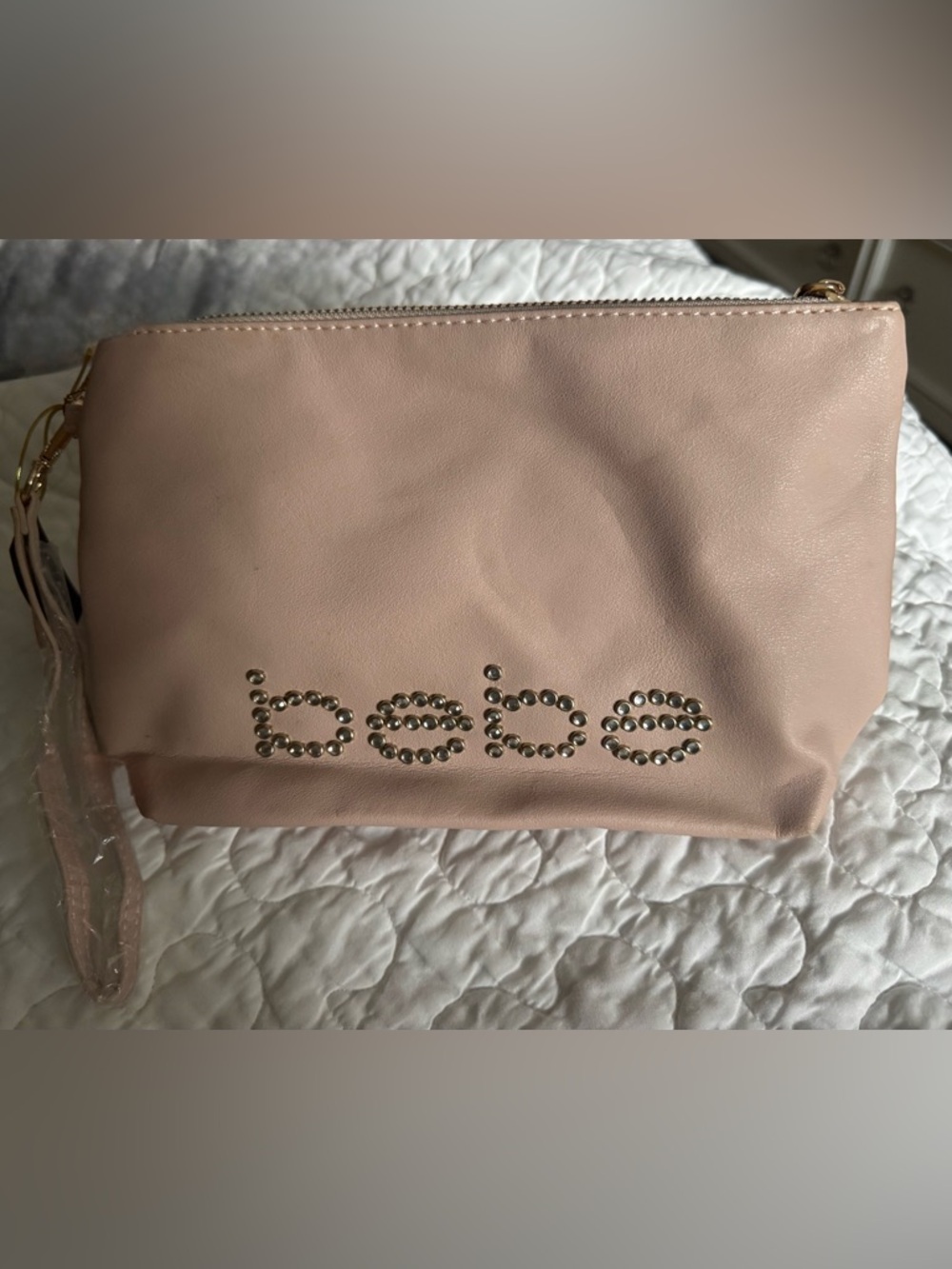 Bebe Blush Pink Zip Clutch with Metallic beading and zipper. NWT